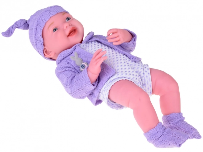 Smiling Baby Doll in Purple Sweater