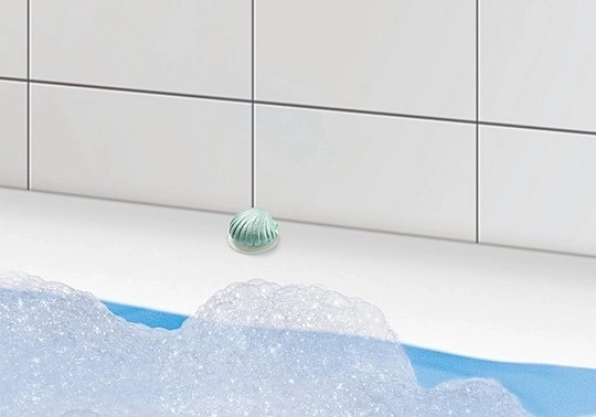 Coquille avec ventouse pour surfaces lisses