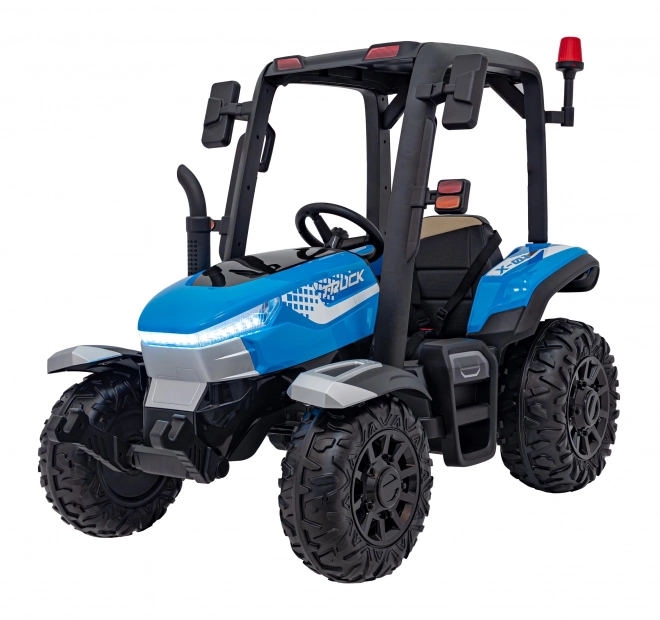 Kindertraktor mit blauem Anhänger