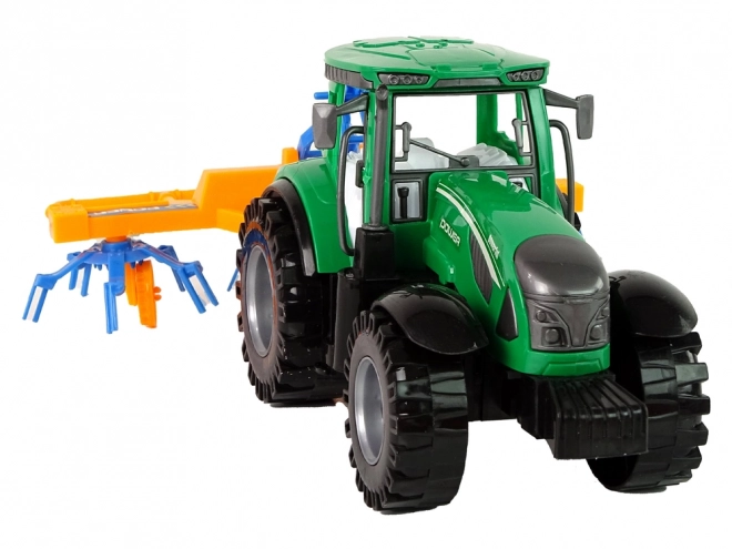 Green Tractor with Friction-Driven Hay Rake