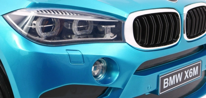 Mașină electrică pentru copii BMW X6M vopsită + telecomandă + EVA + pornire lentă + audio + LED – Modré