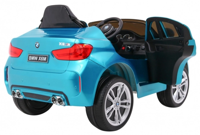 Mașină electrică pentru copii BMW X6M vopsită + telecomandă + EVA + pornire lentă + audio + LED – Modré