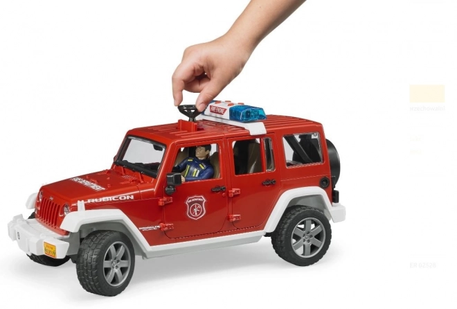 Bruder Red Fire Jeep Wrangler with Firefighter Figure and Accessories