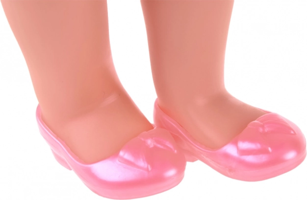 Movable limbs and pink shoes