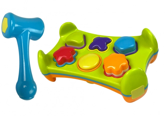 Double-sided educational hammer and shape sorter toy