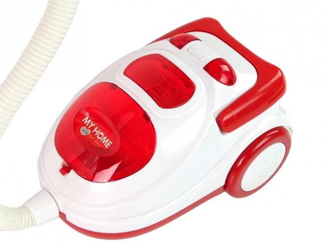 Red Children's Toy Vacuum with Styrofoam Balls