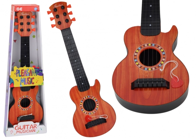 Spielzeuggitarre mit Herzförmigem Plektrum aus Holz in Orange