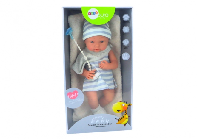 Baby Doll in White and Blue Outfit with Hat and Pacifier