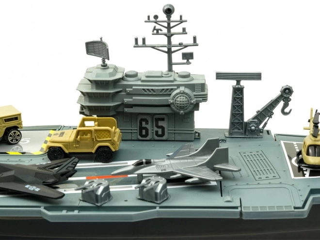 Large Military Aircraft Carrier with Planes and Vehicles