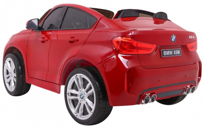 BMW X6M XXL pro 2 děti Červený lak + dálkové ovládání + eko kůže + bezpečnostní pásy + pomalý rozjezd + MP3 + LED