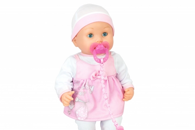 Interactive baby doll with accessories
