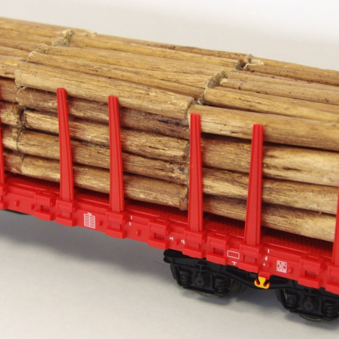 Piko flat wagon with stakes and wood load