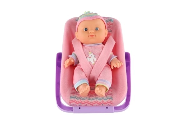 Doll With 20 Cm Plastic Body In Carrier/Car Seat