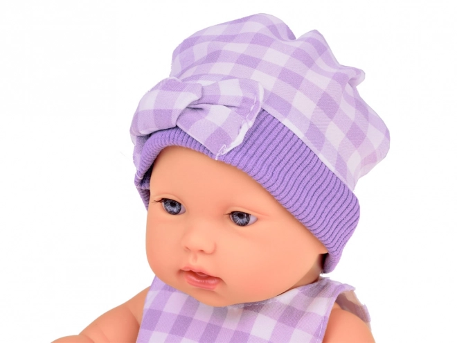 Newborn Doll with Grey Hat and Dress with Bunny Toy