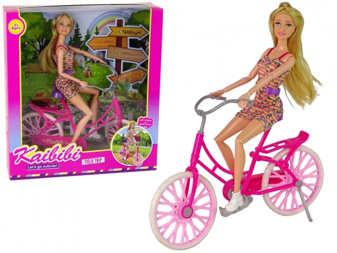 Doll on Pink Bicycle