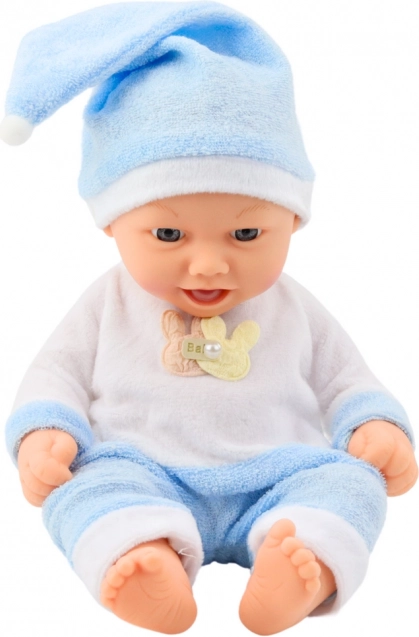 Baby pop in blauwe pyjama met muts met pompon