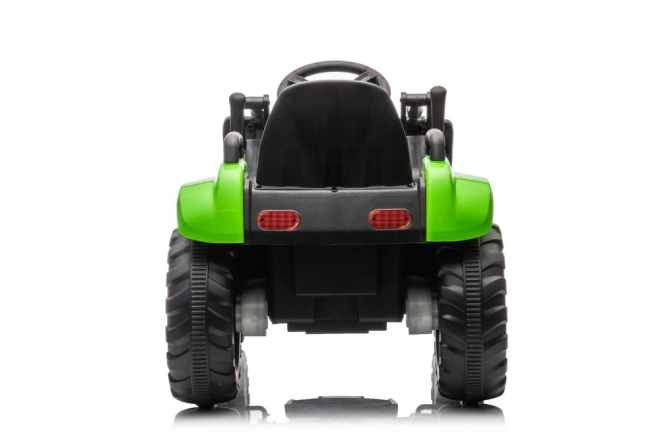 Trattore elettrico per bambini con pala verde