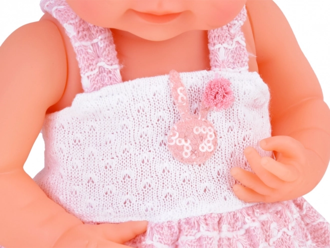 Rubber Baby Doll in Pink Dress with Bottle and Pacifier