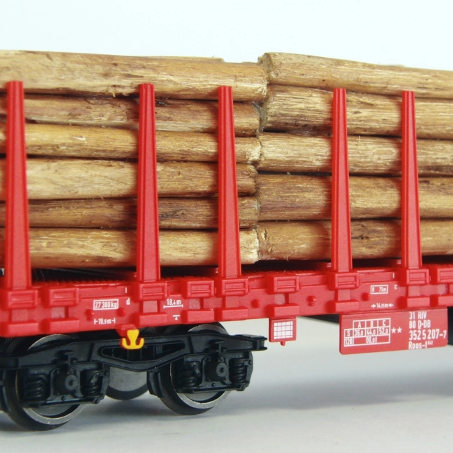 Piko flat wagon with stakes and wood load