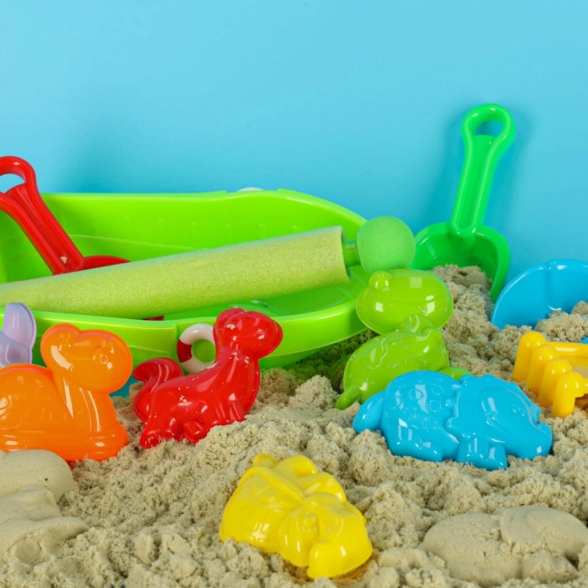 Letto per bambini con giocattoli per sabbia e pistola ad acqua