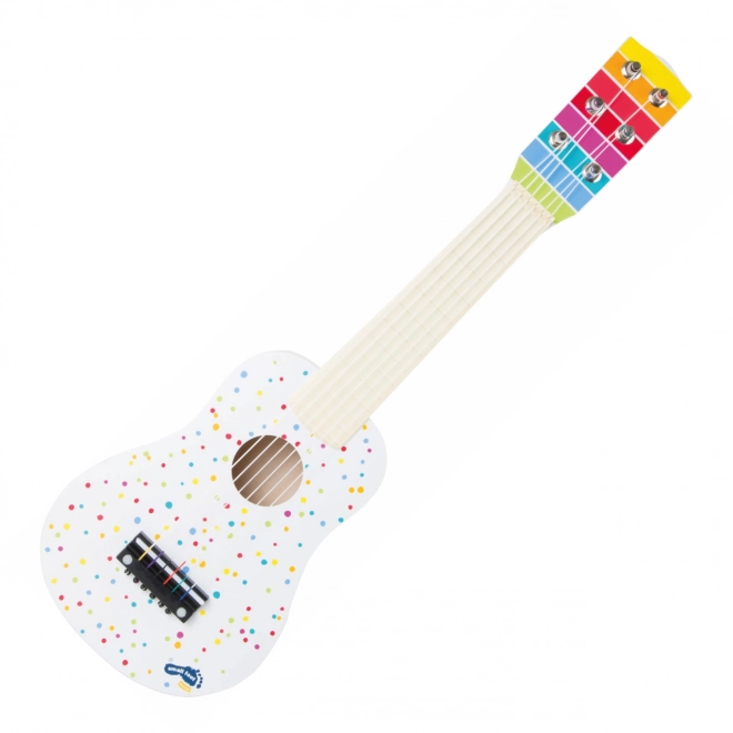 wooden guitar with polka dots