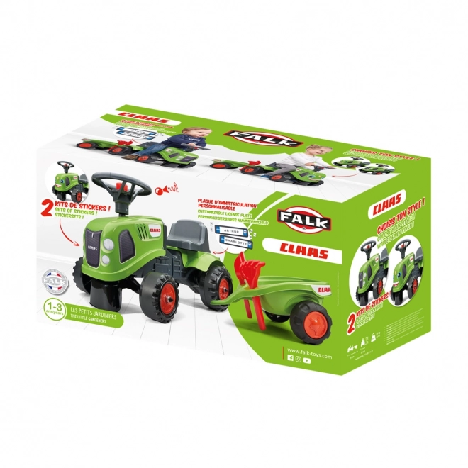 ride-on toy tractor with trailer and gardening tools