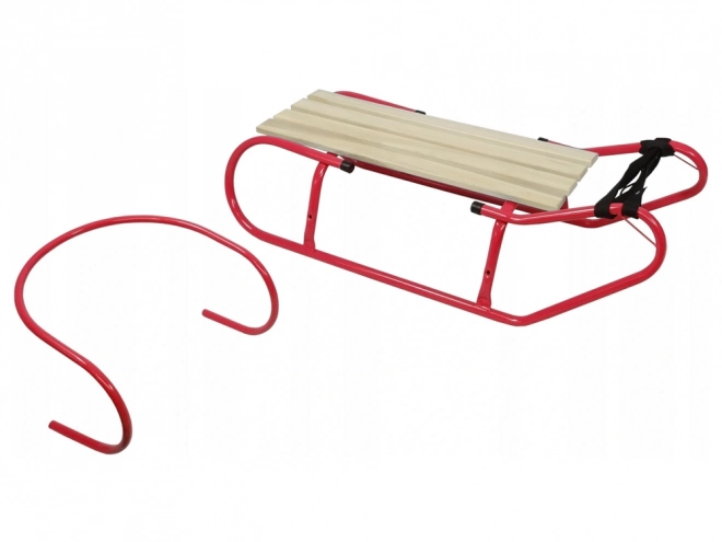 Metal sled with backrest and red strap