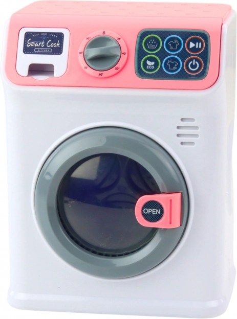 Children's toy washing machine with rotating drum in white-pink