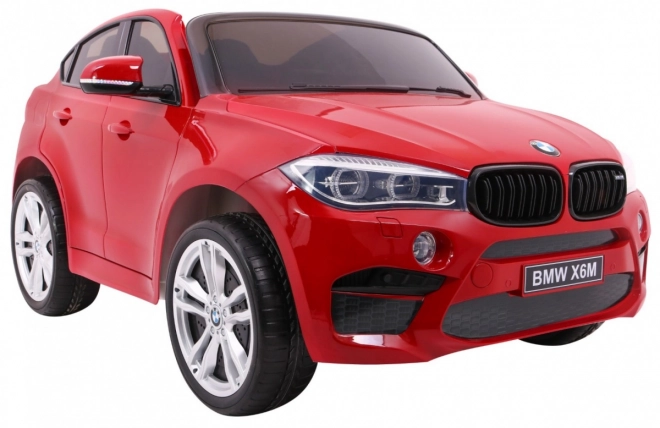 BMW X6M XXL pro 2 děti Červený lak + dálkové ovládání + eko kůže + bezpečnostní pásy + pomalý rozjezd + MP3 + LED