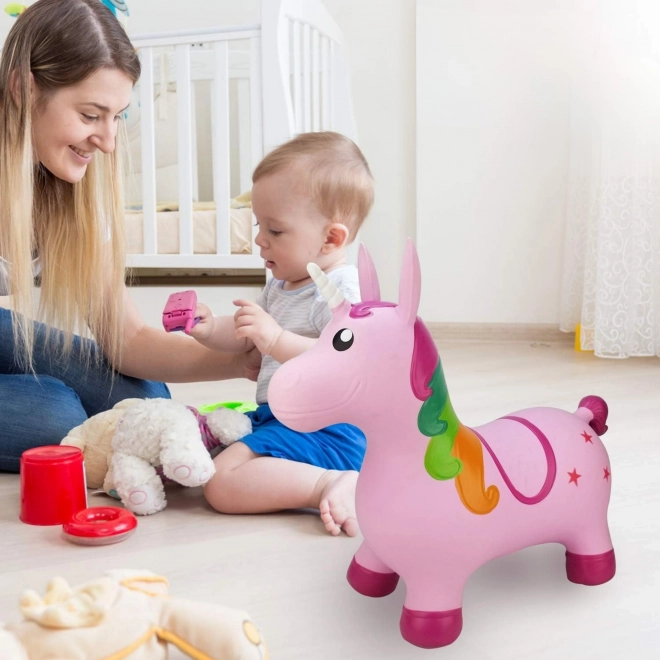 Skakajući jednorog ružičasti Woopie s pumpom