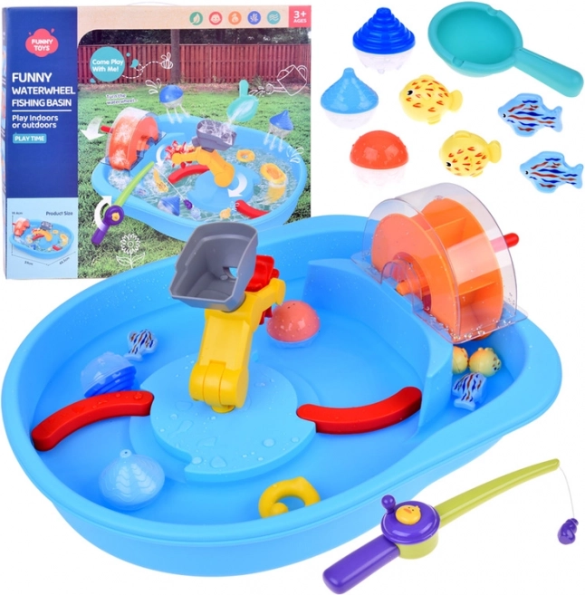 Tavolo d'acqua blu con mulino ad acqua e accessori da pesca