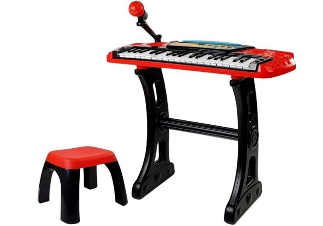 Red 37-key keyboard with stand and seat