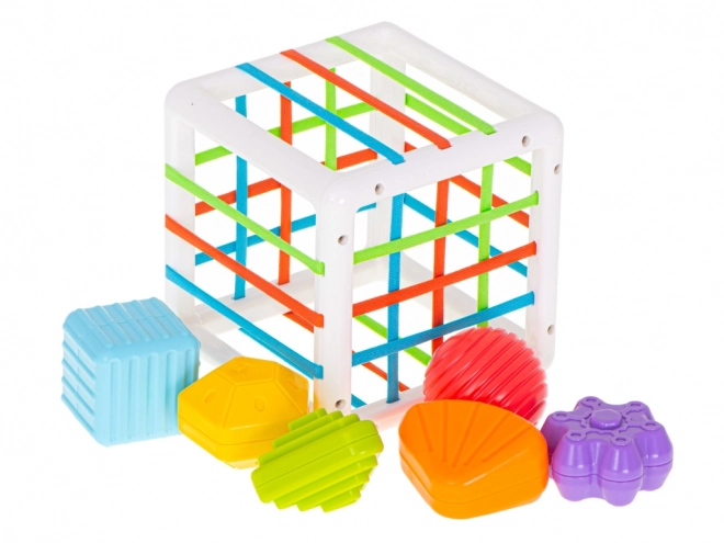 Elastic shape sorting cube toy