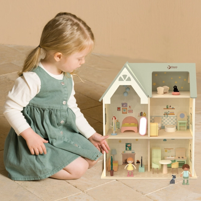 Large wooden dollhouse with furniture