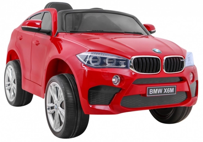 Mașină electrică pentru copii BMW X6M vopsită + telecomandă + EVA + pornire lentă + audio + LED – Červené