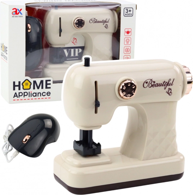 Macchina da cucire per bambini con mouse ed effetti luminosi