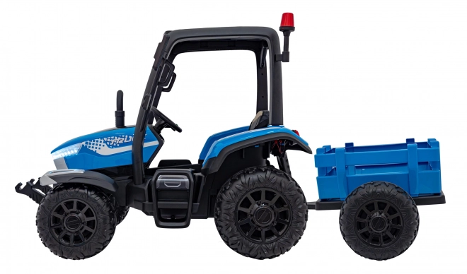 Kindertraktor mit blauem Anhänger