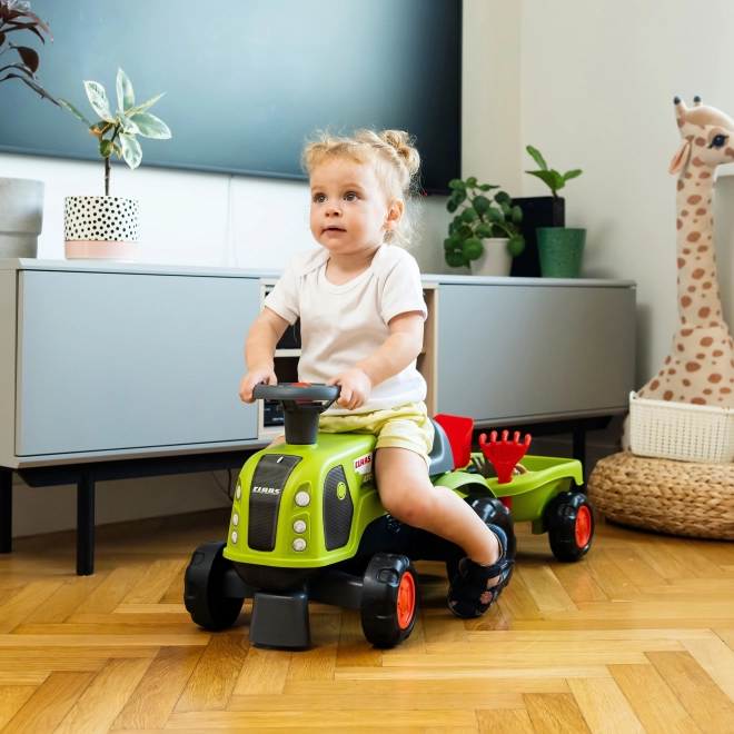 Trattore a spinta Claas Arion con rimorchio e set per la sabbia