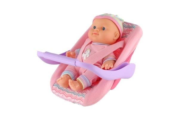 Doll With 20 Cm Plastic Body In Carrier/Car Seat