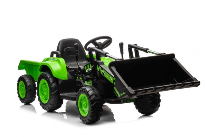 Trattore elettrico per bambini con pala verde