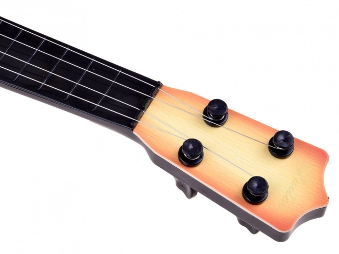 4-string guitar for children with pick – light brown