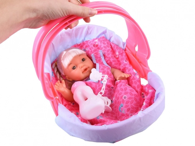 Doll In Carrier With Accessories