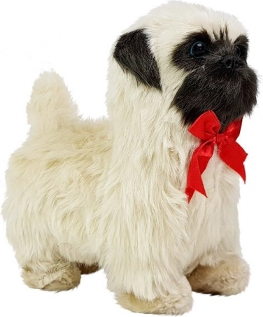 Responds to touch: barks and wags its tail