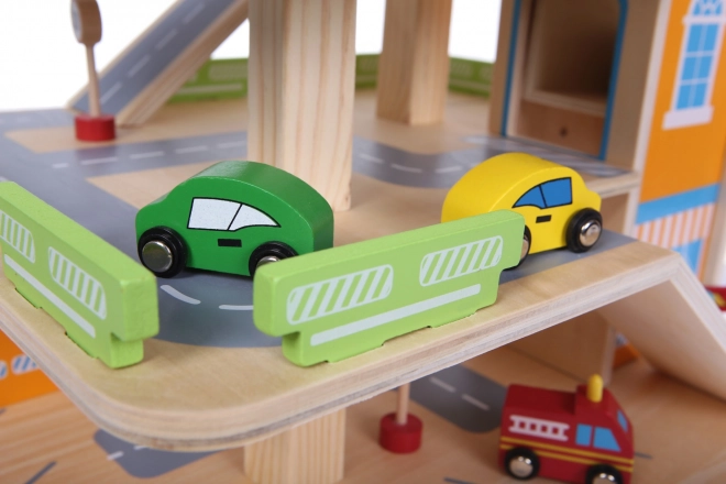 wooden multi-level garage with elevator and toy cars