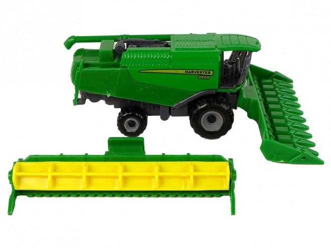 Green and Yellow Toy Farm Tractor with Seeder