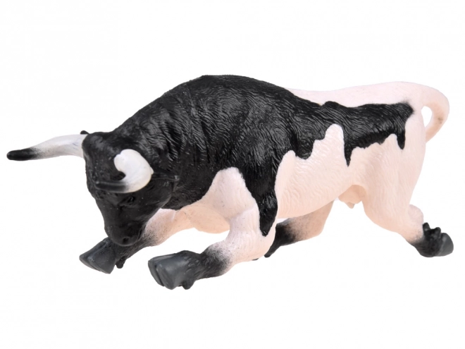 Black and White Bull Figurine Ready to Charge