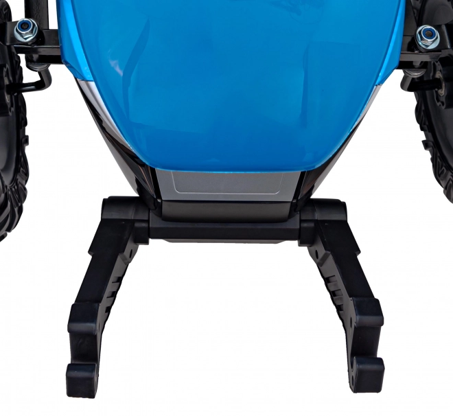 Kindertraktor mit blauem Anhänger