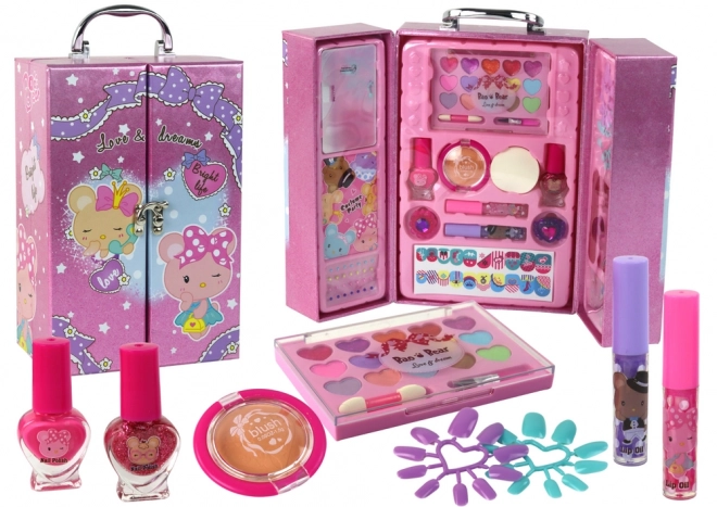 Cosmetic set for makeup and nails in a pink case