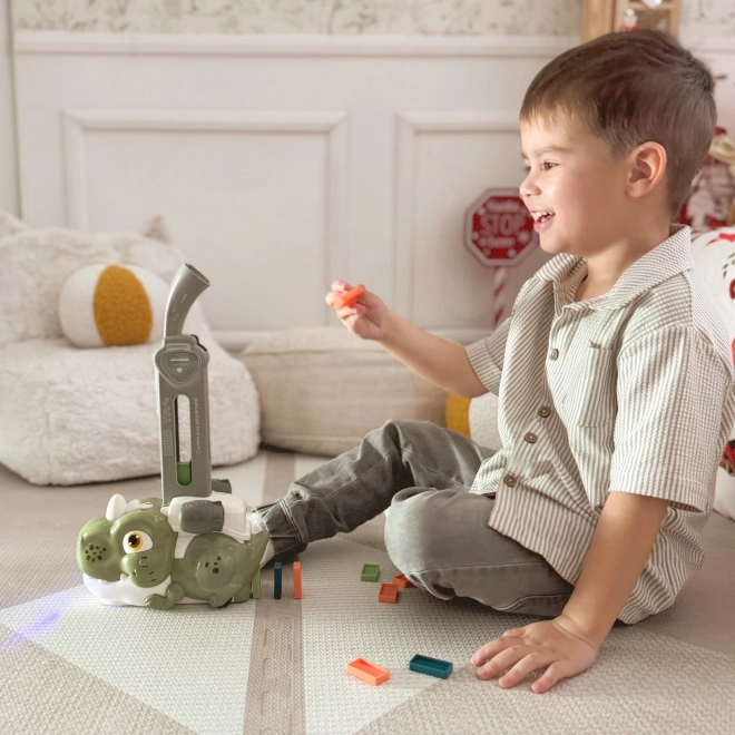 Dinosauro verde interattivo WOOPIE con trenino elettrico e domino