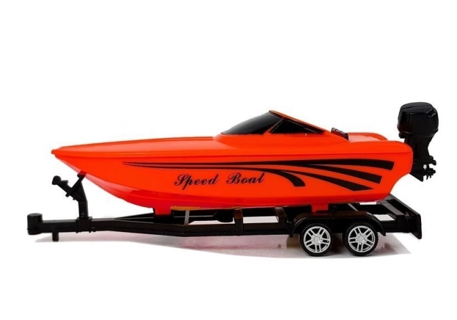 Camper with Red Speedboat and Friction Drive